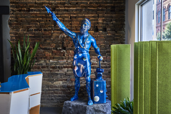 Photo of Kinetic's Vulcan statue in the office.