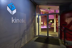 Photo of Kinetic from door, the logo and name can be see on the left.