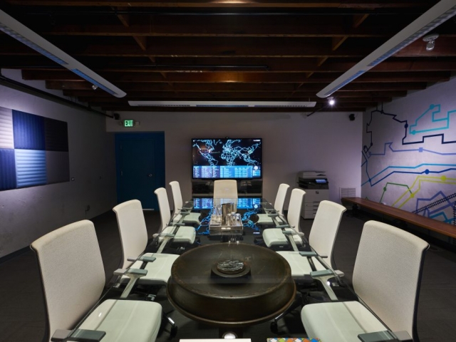 Photo of Kinetic's conference room at night.