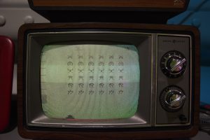 Photo of old TV with an old game on the screen.